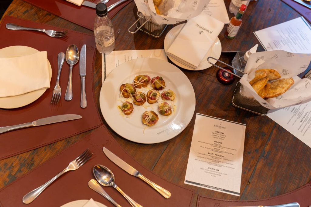 Appetisers and cutlery arranged on a dining table